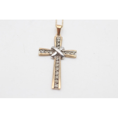 2040 - A 9ct yellow and white gold diamond set cross pendant necklace - approx. gross weight 2.6 grams