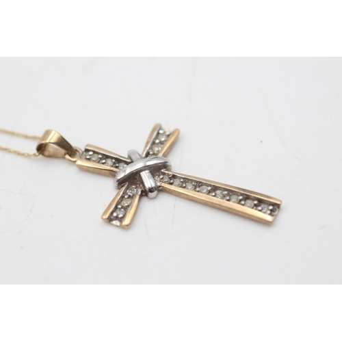 2040 - A 9ct yellow and white gold diamond set cross pendant necklace - approx. gross weight 2.6 grams