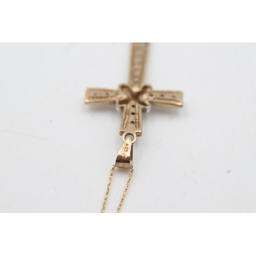 2040 - A 9ct yellow and white gold diamond set cross pendant necklace - approx. gross weight 2.6 grams