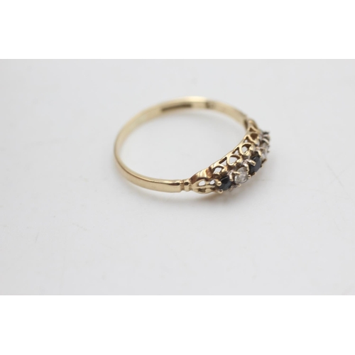 2048 - A hallmarked Birmingham 9ct gold five stone sapphire and clear gemstone set ring, size P½ - approx. ... 