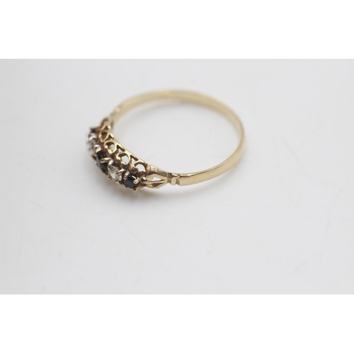 2048 - A hallmarked Birmingham 9ct gold five stone sapphire and clear gemstone set ring, size P½ - approx. ... 