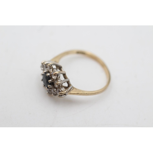 2062 - A 9ct gold sapphire and clear gemstone cluster dress ring, size M½ - approx. gross weight 2.3 grams