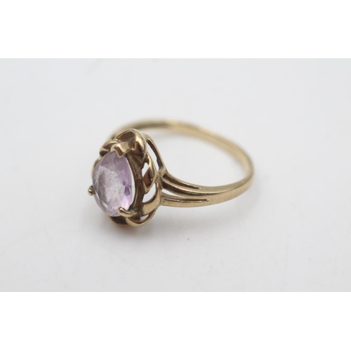 2065 - A 9ct gold amethyst solitaire dress ring, size N½ - approx. gross weight 2.4 grams