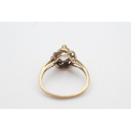 2065 - A 9ct gold amethyst solitaire dress ring, size N½ - approx. gross weight 2.4 grams