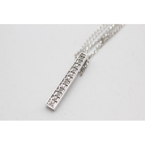 2093 - A 9ct white gold diamond set bar drop pendant necklace - approx. gross weight 1.6 grams