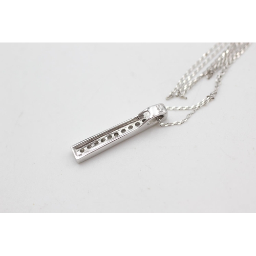 2093 - A 9ct white gold diamond set bar drop pendant necklace - approx. gross weight 1.6 grams