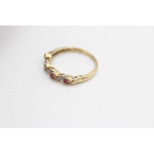 2096 - A hallmarked Sheffield 9ct gold ruby and diamond dress ring, size P - approx. gross weight 2.1 grams