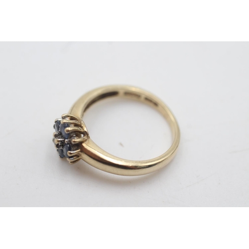 2097 - A hallmarked Birmingham 9ct gold sapphire and diamond floral cluster dress ring, size O - approx. gr... 