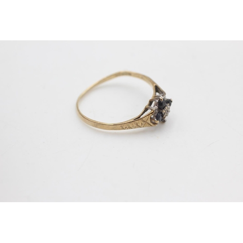 2105 - A hallmarked Birmingham 9ct gold diamond and sapphire floral set ring, size V½ - approx. gross weigh... 