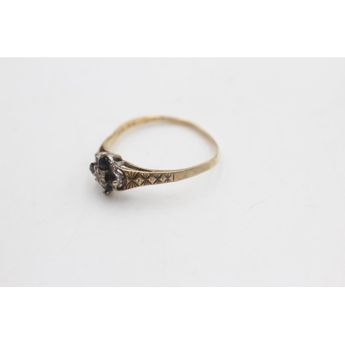 2105 - A hallmarked Birmingham 9ct gold diamond and sapphire floral set ring, size V½ - approx. gross weigh... 