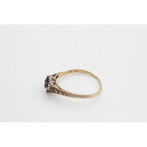 2105 - A hallmarked Birmingham 9ct gold diamond and sapphire floral set ring, size V½ - approx. gross weigh... 