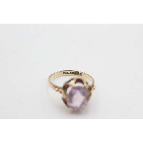 2106 - Two 9ct gold amethyst solitaire cocktail rings, one size K½ and one size L - approx. gross weight 5.... 