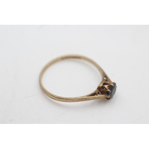 2109 - A 9ct gold sapphire solitaire cathedral setting ring, size R½ - approx. gross weight 1.3 grams