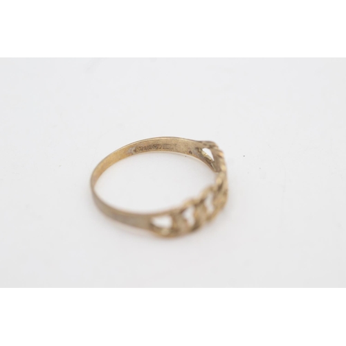 2112 - A hallmarked Birmingham 9ct gold rope twist band ring, size N½ - approx. gross weight 1 gram