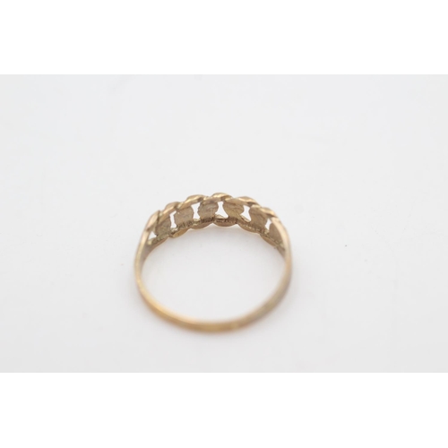 2112 - A hallmarked Birmingham 9ct gold rope twist band ring, size N½ - approx. gross weight 1 gram