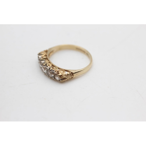 2113 - A hallmarked Birmingham 9ct gold ornate gypsy set clear gemstone ring, size L½  -approx. gross weigh... 