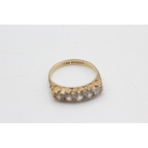 2113 - A hallmarked Birmingham 9ct gold ornate gypsy set clear gemstone ring, size L½  -approx. gross weigh... 