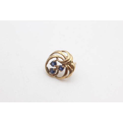 2117 - A pair of 9ct gold sapphire ornate twirl openwork stud earrings - approx. gross weight 2.3 grams