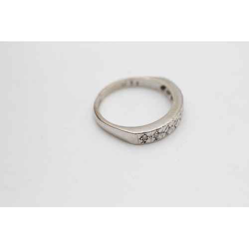 2119 - A hallmarked Birmingham 9ct white gold diamond half eternity ring, size L½ - approx. gross weight 2.... 