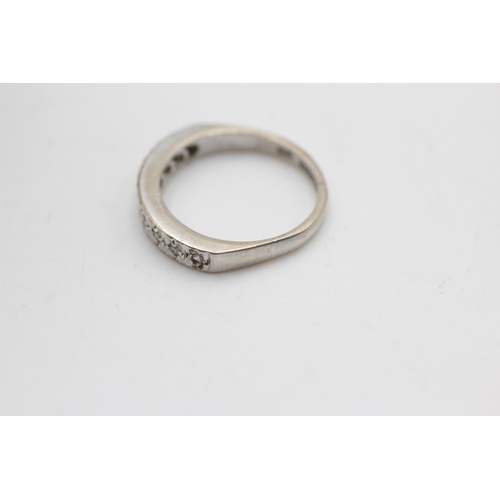 2119 - A hallmarked Birmingham 9ct white gold diamond half eternity ring, size L½ - approx. gross weight 2.... 