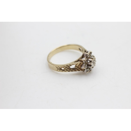 2120 - A 9ct gold diamond starburst set ring, size M½ - approx. gross weight 2.8 grams