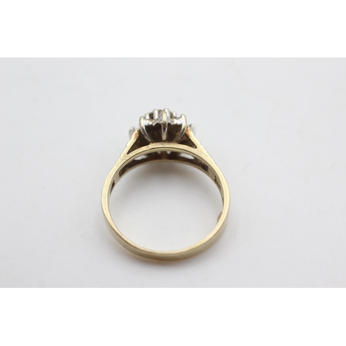 2120 - A 9ct gold diamond starburst set ring, size M½ - approx. gross weight 2.8 grams