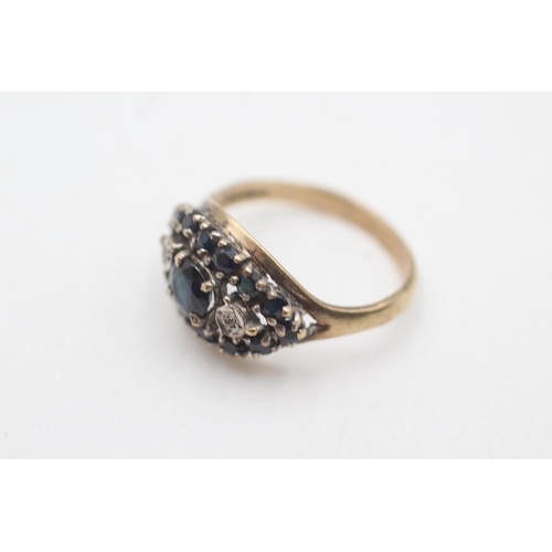 2122 - A hallmarked London 9ct gold sapphire and diamond eye shaped cluster dress ring, size P½ - approx. g... 