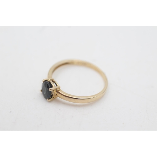 2130 - A hallmarked Birmingham 9ct gold sapphire solitaire ring ,size O - approx. gross weight 1.5 grams