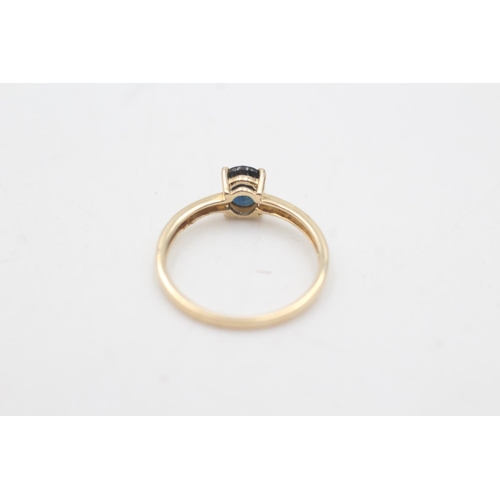 2130 - A hallmarked Birmingham 9ct gold sapphire solitaire ring ,size O - approx. gross weight 1.5 grams