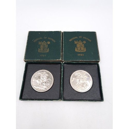 75 - A collection of assorted cased coins to include Coronation crowns, Britain's First decimal coin set ... 