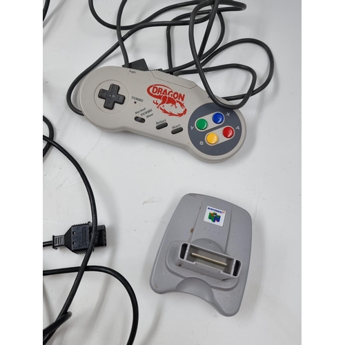 1527 - A selection of retro Nintendo accessories, three NES controllers, one SNES controller, two GameCube ... 