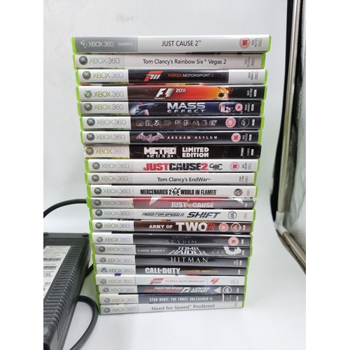 1524 - A large collection of Xbox 360 consoles, games and accessories to include three consoles, Just Cause... 