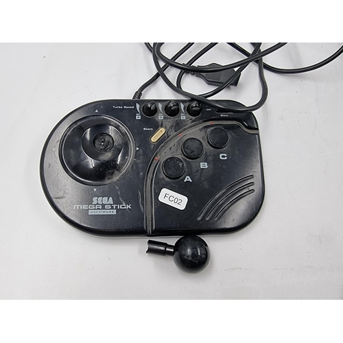 1514 - A Sega Mega Drive Flashback console with Sega Mega Stick controller pad