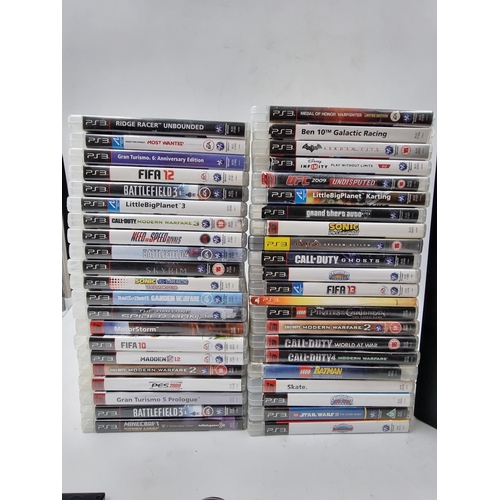 1507 - A collection of various Sony PlayStation items to include PlayStation 2 console with controllers and... 