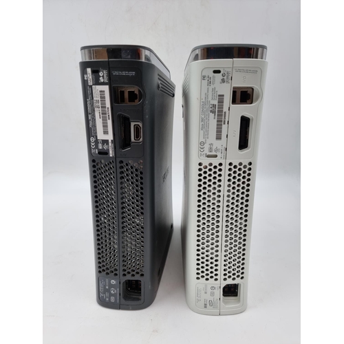 1508 - Two Xbox 360 consoles with HDDs