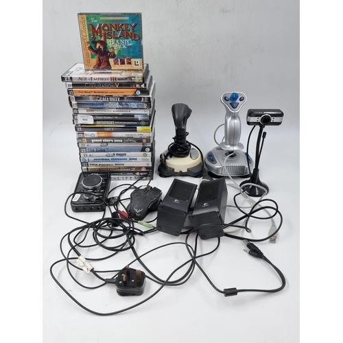 1502 - A collection of computer games and accessories to include Astro A40 Mixamp, CORSAIR gaming mouse and... 