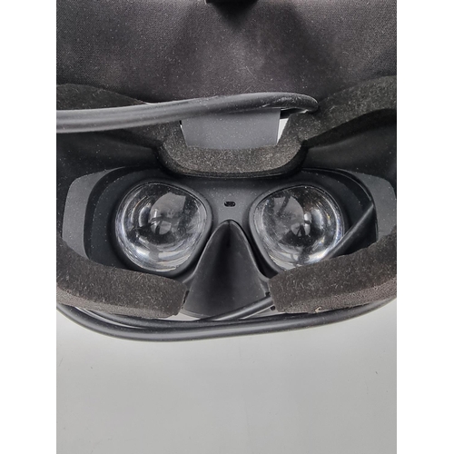 1503 - Two VR headsets, one Lenovo OCULUS rift S and one DESTEK V4 smartphone VR headset