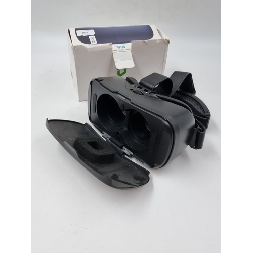 1503 - Two VR headsets, one Lenovo OCULUS rift S and one DESTEK V4 smartphone VR headset