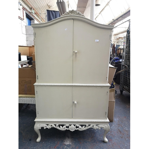 1148 - A French style white painted four door cabinet with cabriole supports - approx. 173cm high x 97cm wi... 