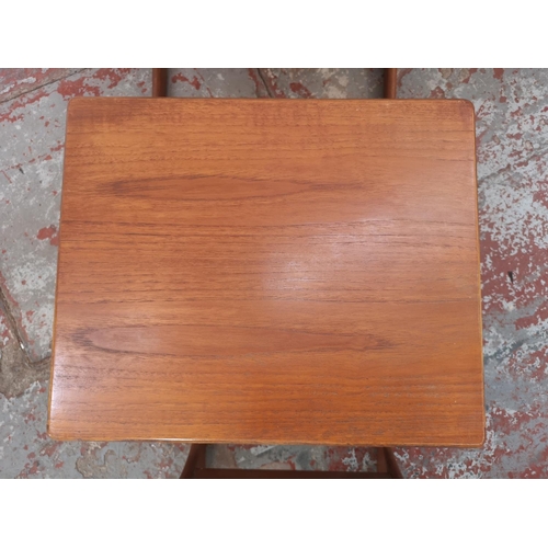 1003 - A teak nest of three tables - approx. 50cm high x 56cm wide x 45cm deep