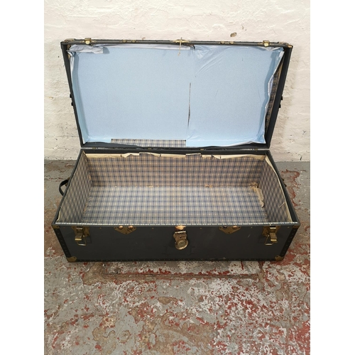 1021 - An early 20th century blue and brass mounted travel trunk - approx. 36cm high x 100cm wide x 52cm de... 