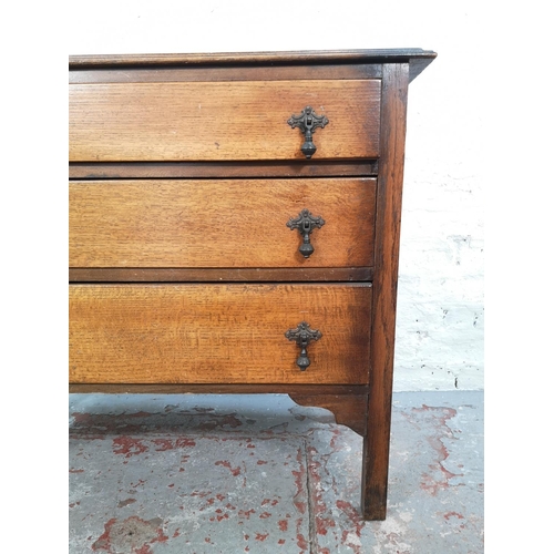 1023 - A 1930s oak chest of three drawers - approx. 86cm high x 88cm wide x 41cm deep