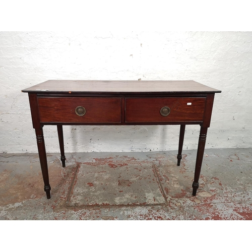 1030 - A 19th century mahogany two drawer rectangular console table - approx. 81cm high x 121cm wide x 51cm... 