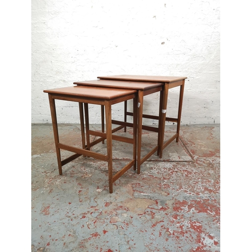 1038A - A teak nest of three tables - largest approx. 52cm high x 54cm wide x 39cm deep