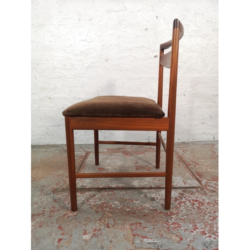 1046 - An A.H. McIntosh teak extending dining table and four matching chairs - approx. 74cm high x 91cm wid... 