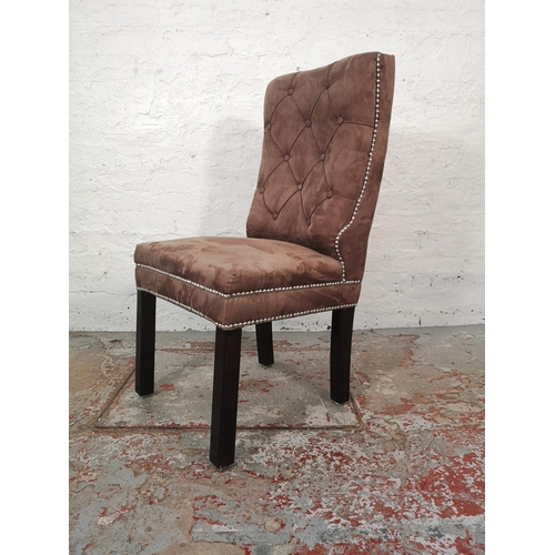 1056 - A pair of modern brown suede button back dining chairs with metal studding - approx. 100cm high x 49... 