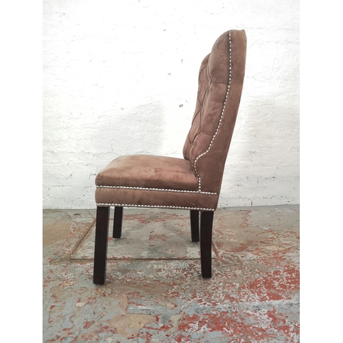 1056 - A pair of modern brown suede button back dining chairs with metal studding - approx. 100cm high x 49... 