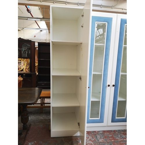 1059 - A contemporary white painted and blue fabric mirrored door wardrobe with four internal shelves - app... 