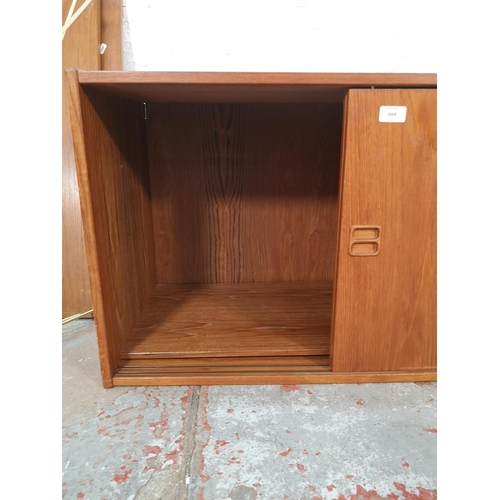 1064 - A mid 20th century Danish teak modular wall system cabinet with shelving - cabinet approx. 50cm high... 