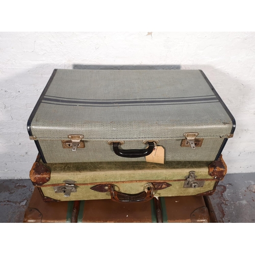 1073 - Seven assorted antique and vintage suitcases and travel trunks - largest approx. 33cm high x 90cm wi... 